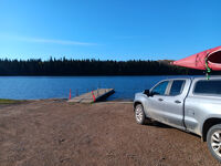 My truck and kayak at the boat launch.